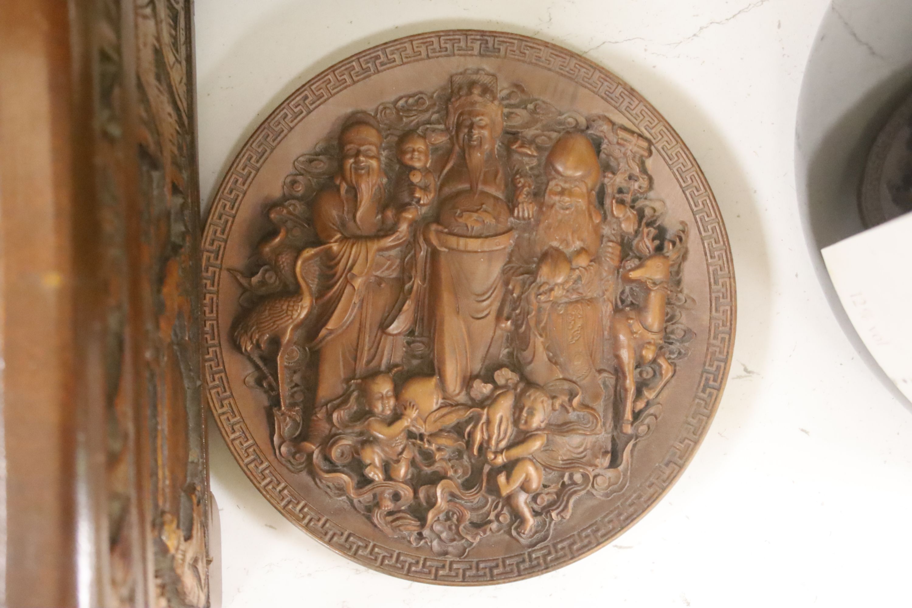 A quantity of 20th century Chinese carved bamboo and wooden effects to include a large brush pot, 17cm high (7)